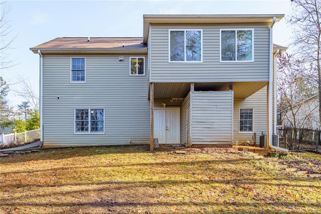 450 High Ridge Lane Dahlonega, GA 30533 - Photo 33 of 39 a front view of a house with a yard