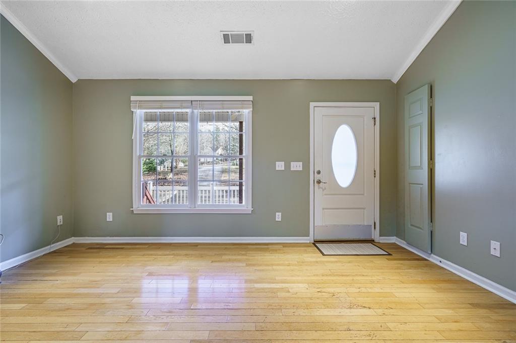 450 High Ridge Lane Dahlonega, GA 30533 - Photo 4 of 39 wooden floor and window in a room