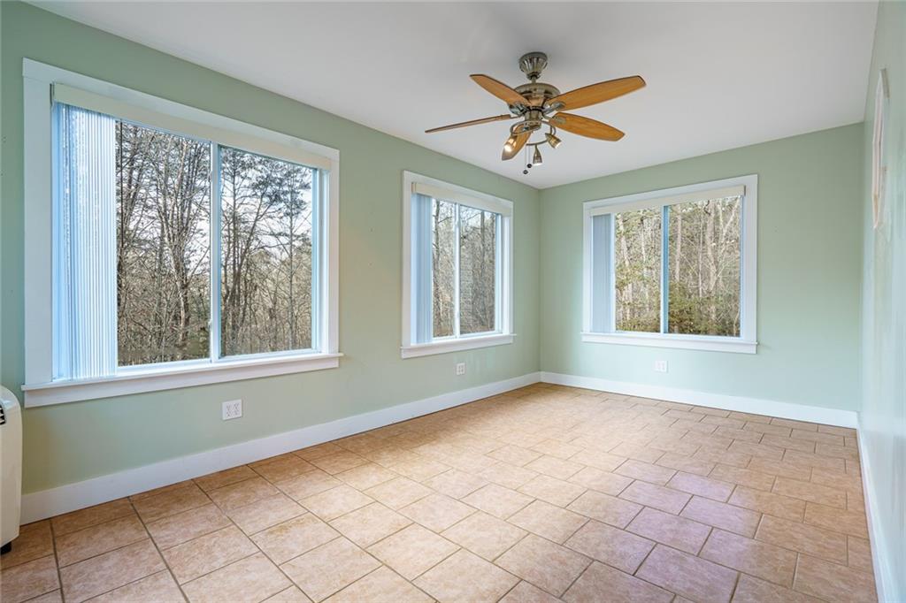 450 High Ridge Lane Dahlonega, GA 30533 - Photo 10 of 39 a view of an empty room with a window