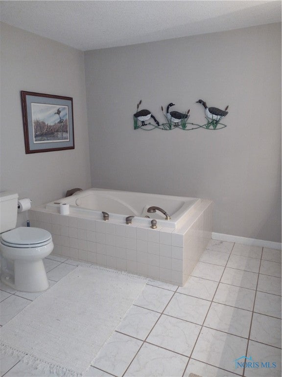 124 Country Club Road Bryan, OH 43506 - Photo 15 of 49 Primary bathroom with seperate tub and shower.