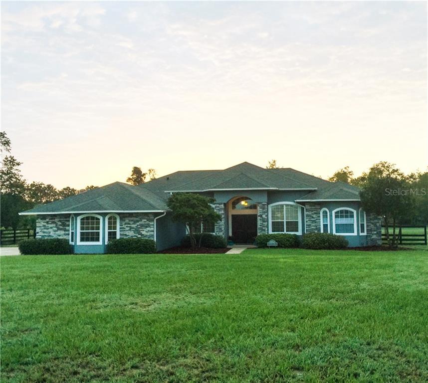 28542 Atlantis Road Tavares, FL 32778 - Photo 1 of 1 Front, beautiful setting