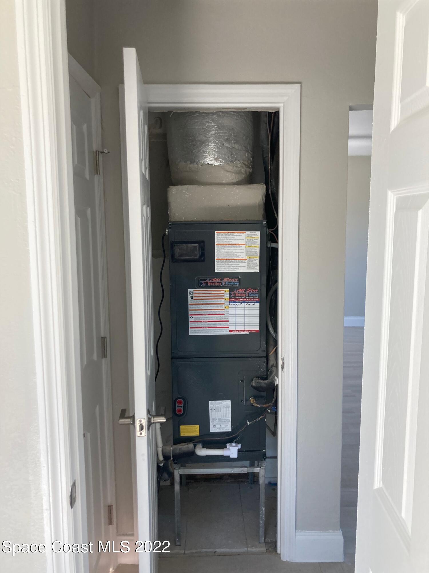 1051 Mitchell Street Cocoa, FL 32922 - Photo 21 of 21 a view of storage and utility room