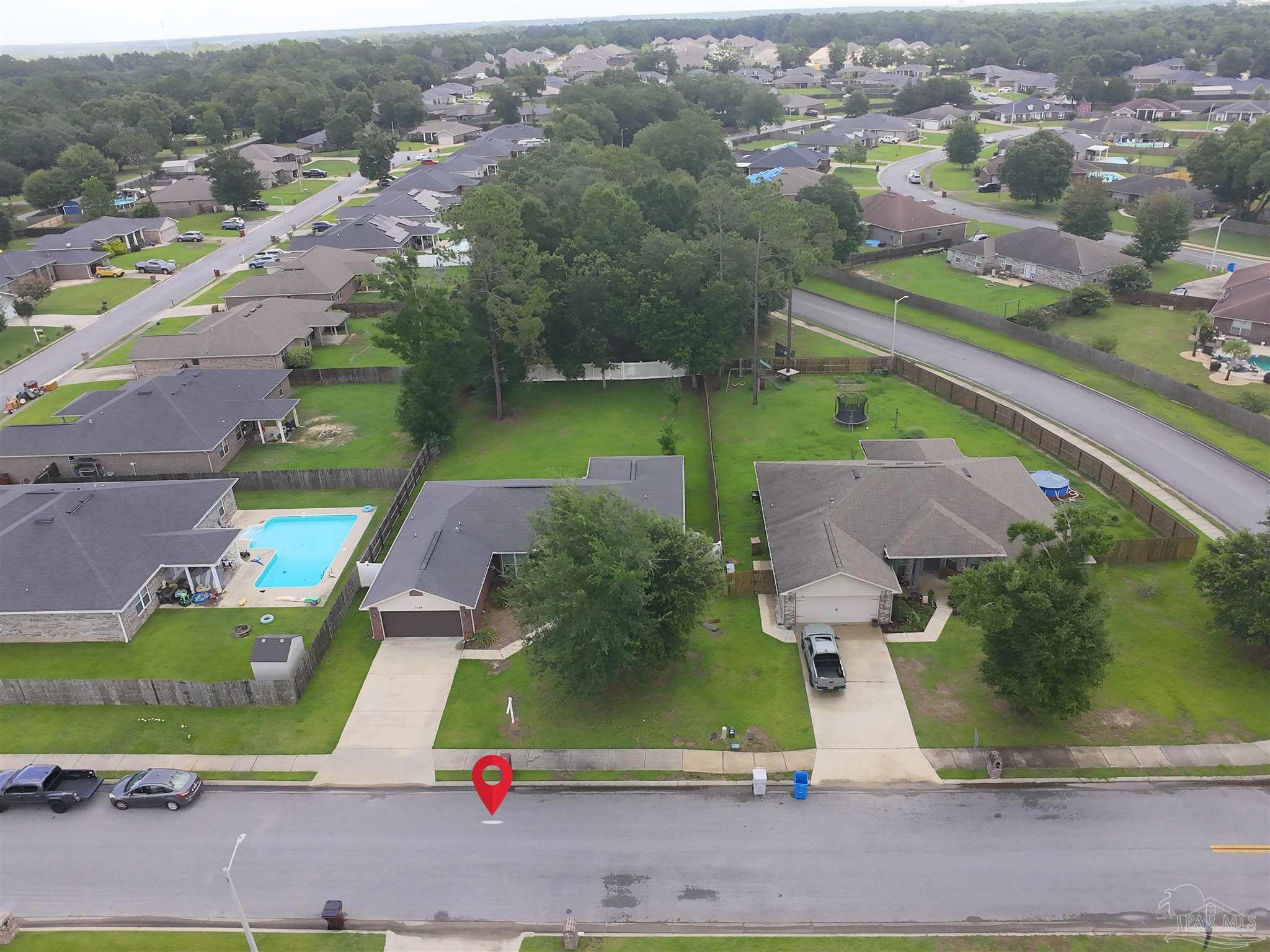 5709 Mill Stream Way Pace, FL 32571 - Photo 5 of 48 an aerial view of a house