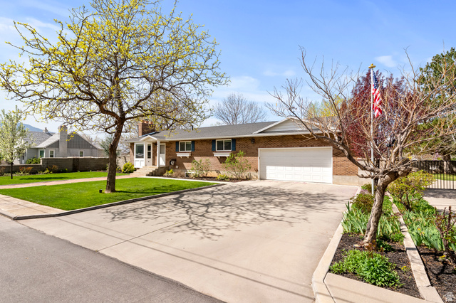 141 North 600 East Mapleton, UT 84664 - Photo 41 of 44 Single story home featuring driveway, a garage, brick siding, and a chimney