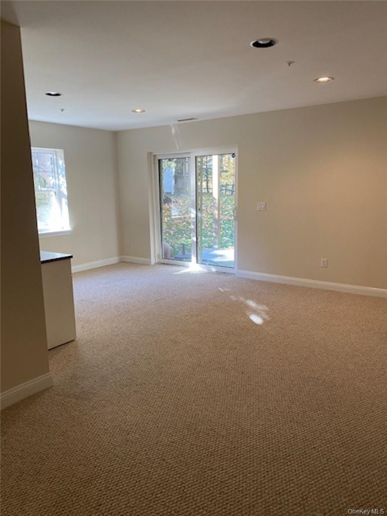51 Winding Ridge Road White Plains, NY 10603 - Photo 12 of 30 an empty room with windows