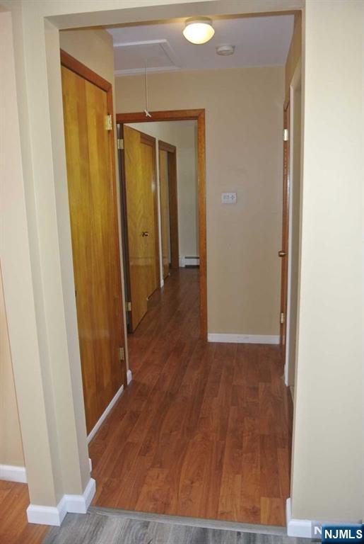 164 Scoles Avenue, Unit 2 Clifton, NJ 07012 - Photo 10 of 16 a view of a hallway with wooden floor
