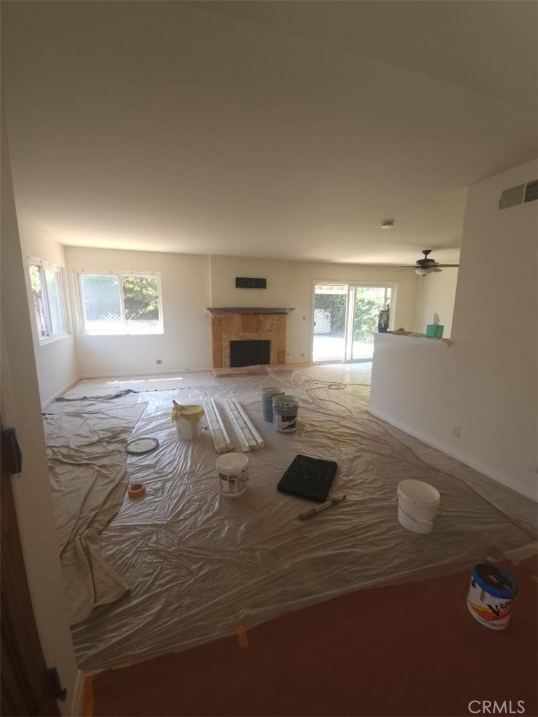 1111 Valley Circle Costa Mesa, CA 92627 - Photo 2 of 7 a bedroom with a bed and a couch