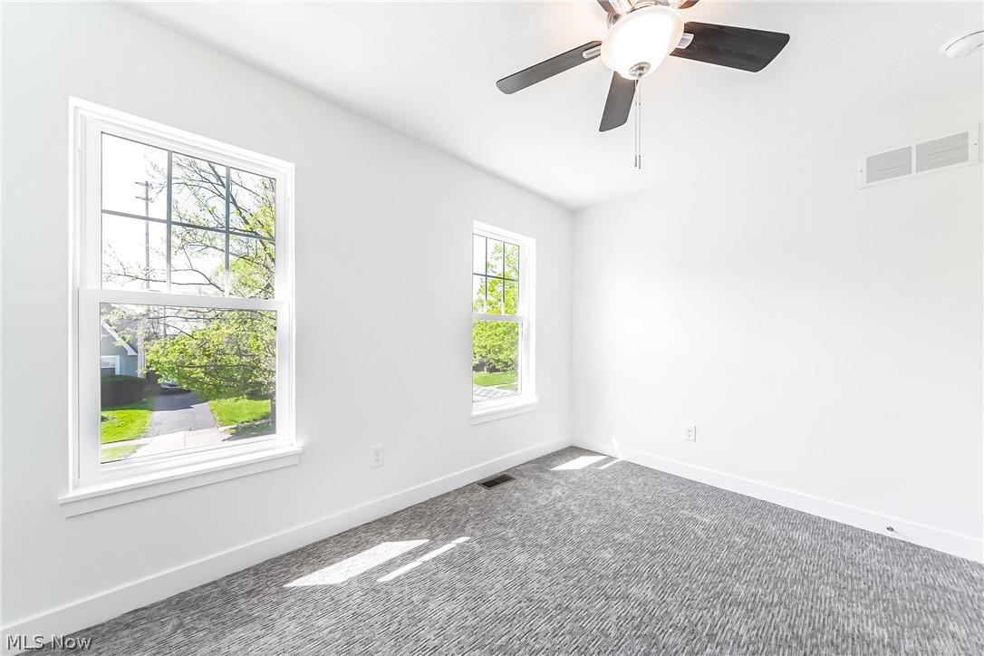 3959 Ardmore Road Cleveland Heights, OH 44121 - Photo 22 of 38 Carpeted spare room featuring ceiling fan