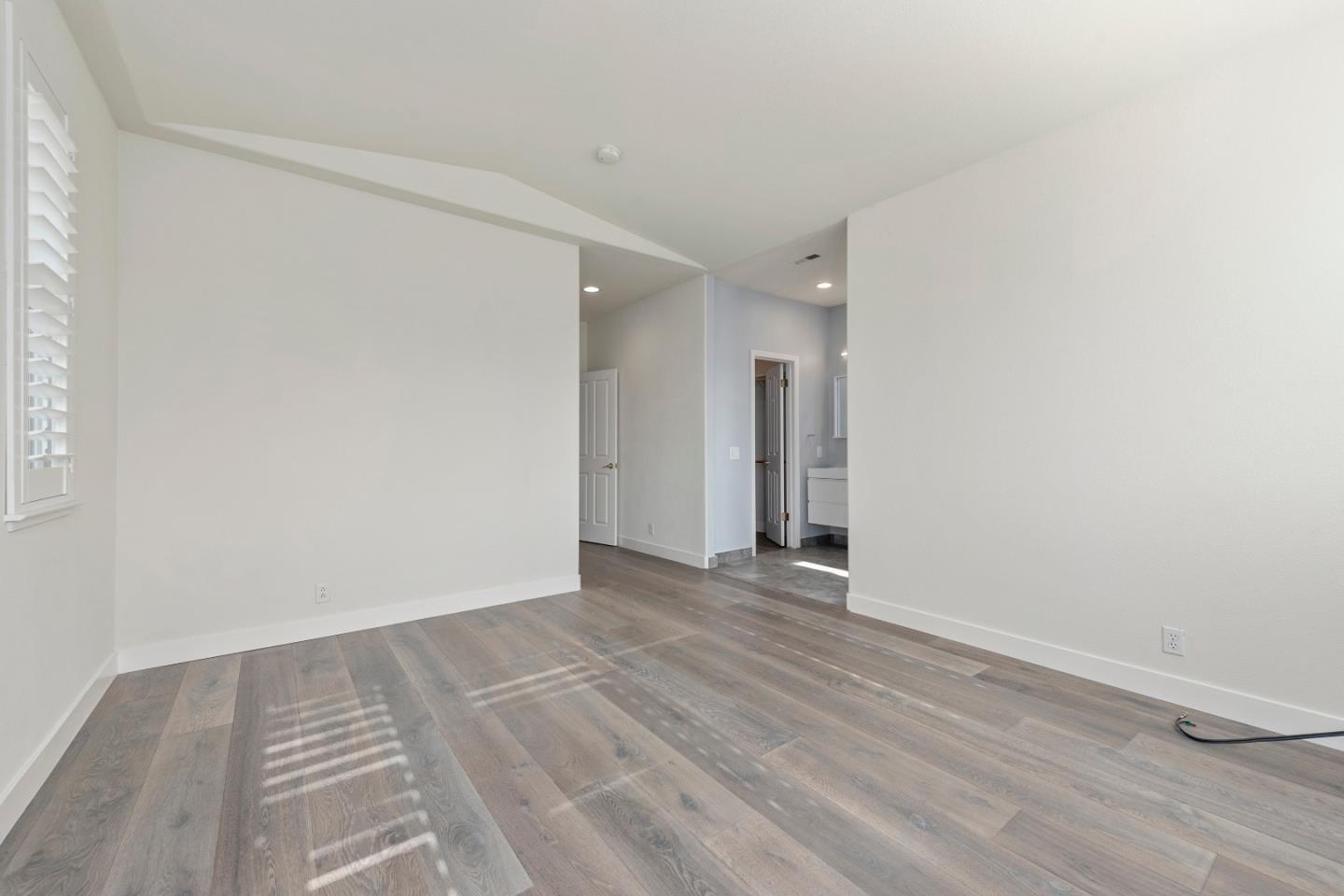 72 Cannery Circle Campbell, CA 95008 - Photo 9 of 20 a view of an empty room and wooden floor