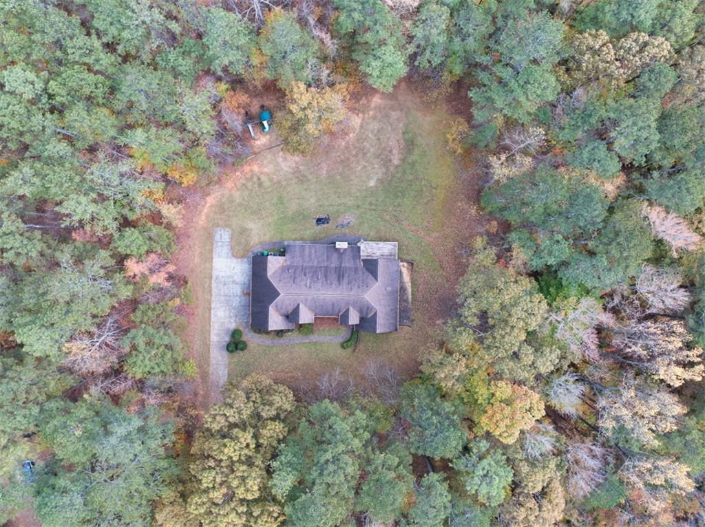 3357 Rising Fawn Trail Suwanee, GA 30024 - Photo 2 of 93 an aerial view of a house with a yard
