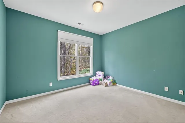 a view of a house with backyard and garden