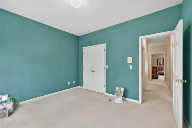 a view of balcony with wooden floor and fence