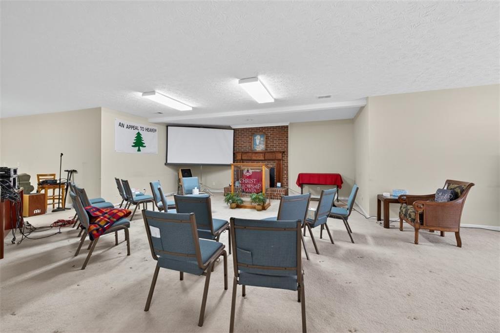 3357 Rising Fawn Trail Suwanee, GA 30024 - Photo 46 of 93 a view of a dining area with furniture