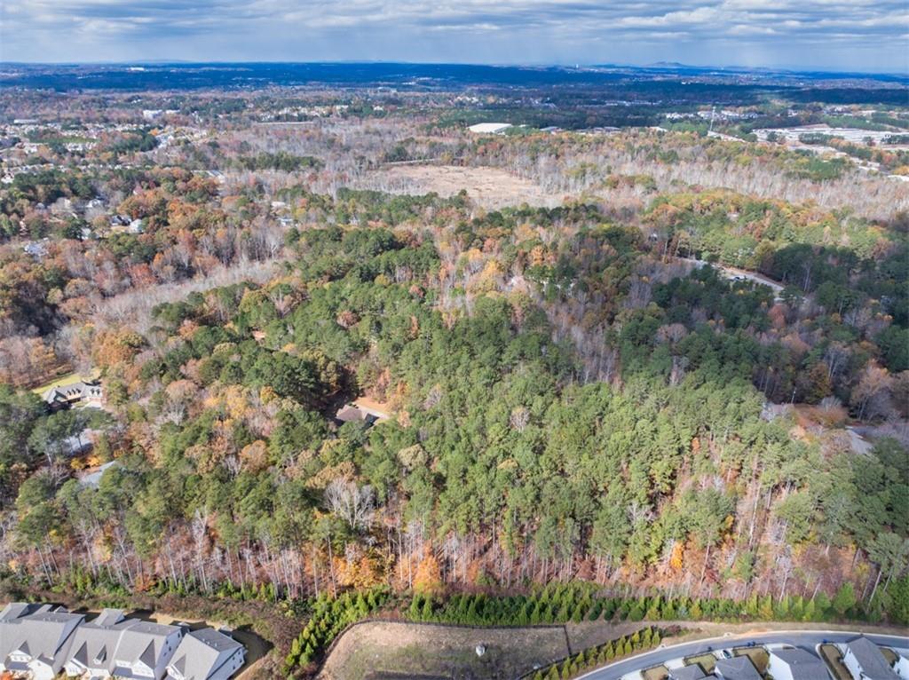 3357 Rising Fawn Trail Suwanee, GA 30024 - Photo 85 of 93 a view of a yard with an outdoor space