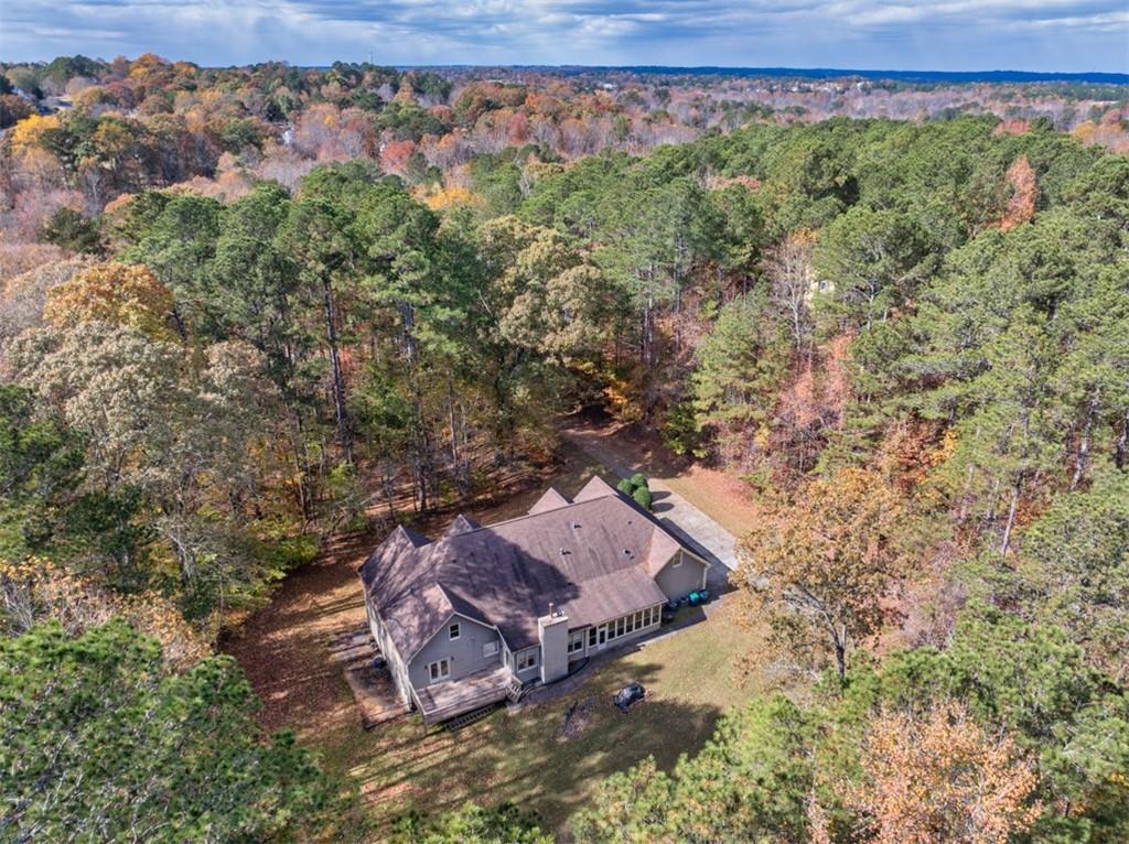 3357 Rising Fawn Trail Suwanee, GA 30024 - Photo 87 of 93 an aerial view of a house with a yard
