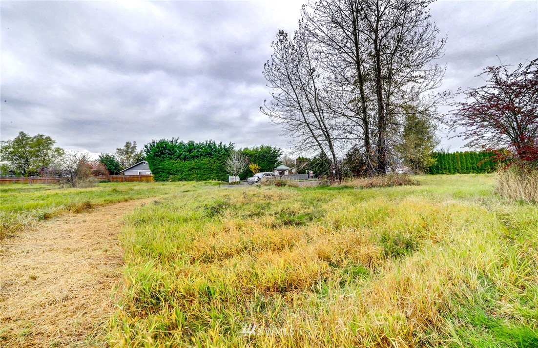 0 Johnson Street Enumclaw, WA 98022 - Photo 16 of 17 a view of a garden with trees