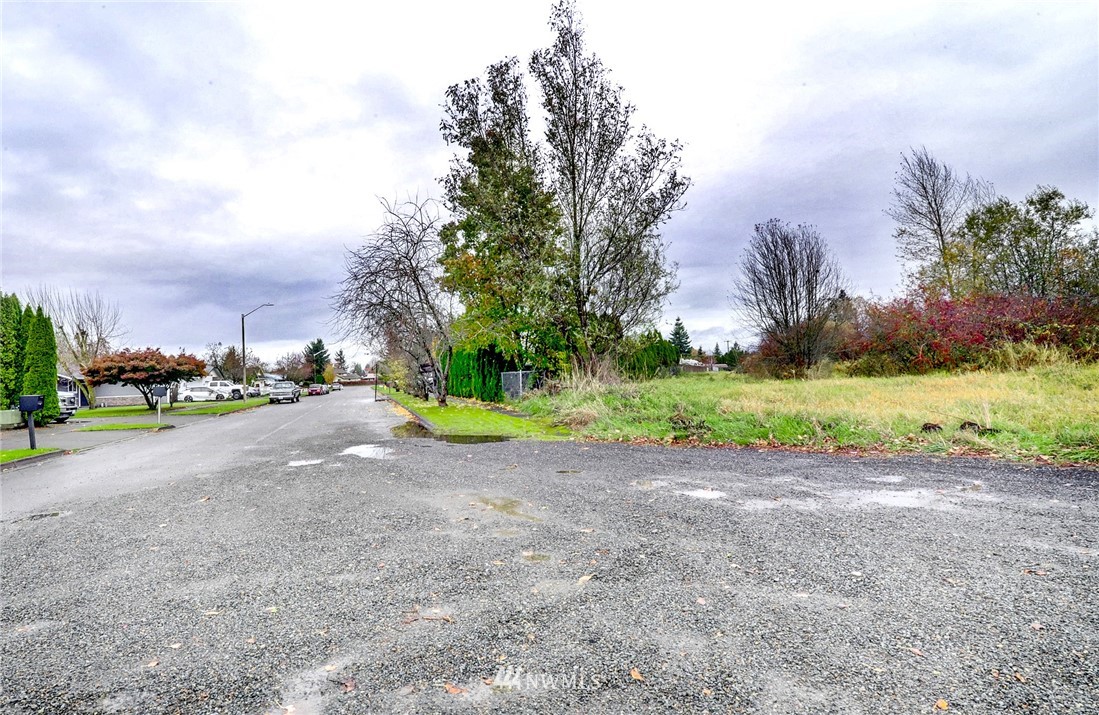 0 Johnson Street Enumclaw, WA 98022 - Photo 7 of 17 a view of a road with a house in the background