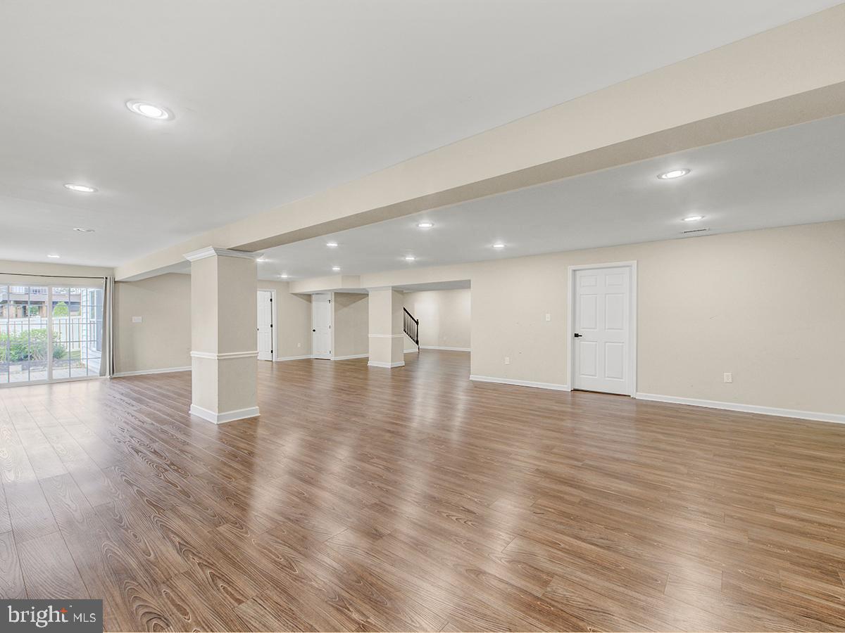 540 Morgan Drive Mickleton, NJ 08056 - Photo 20 of 33 a view of an empty room with wooden floor and a window