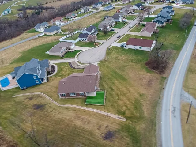 a aerial view of a house with outdoor space