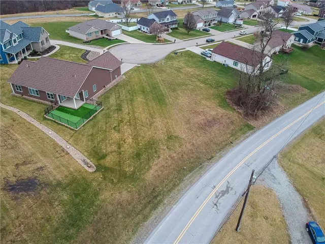 a aerial view of a house with garden