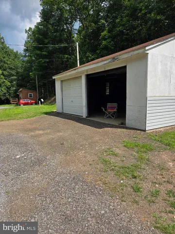 a view of backyard and entertaining space