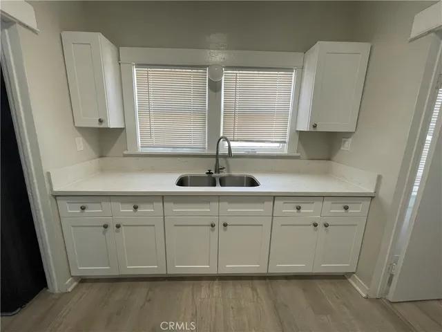 a bathroom with a toilet and a sink
