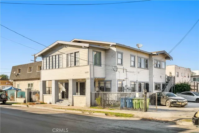 a front view of a building with street view