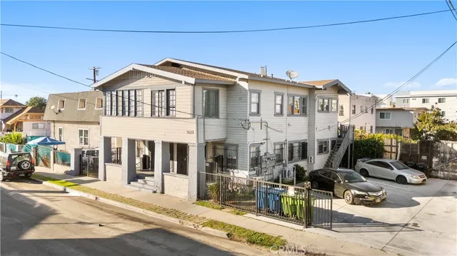 a front view of a building with street view
