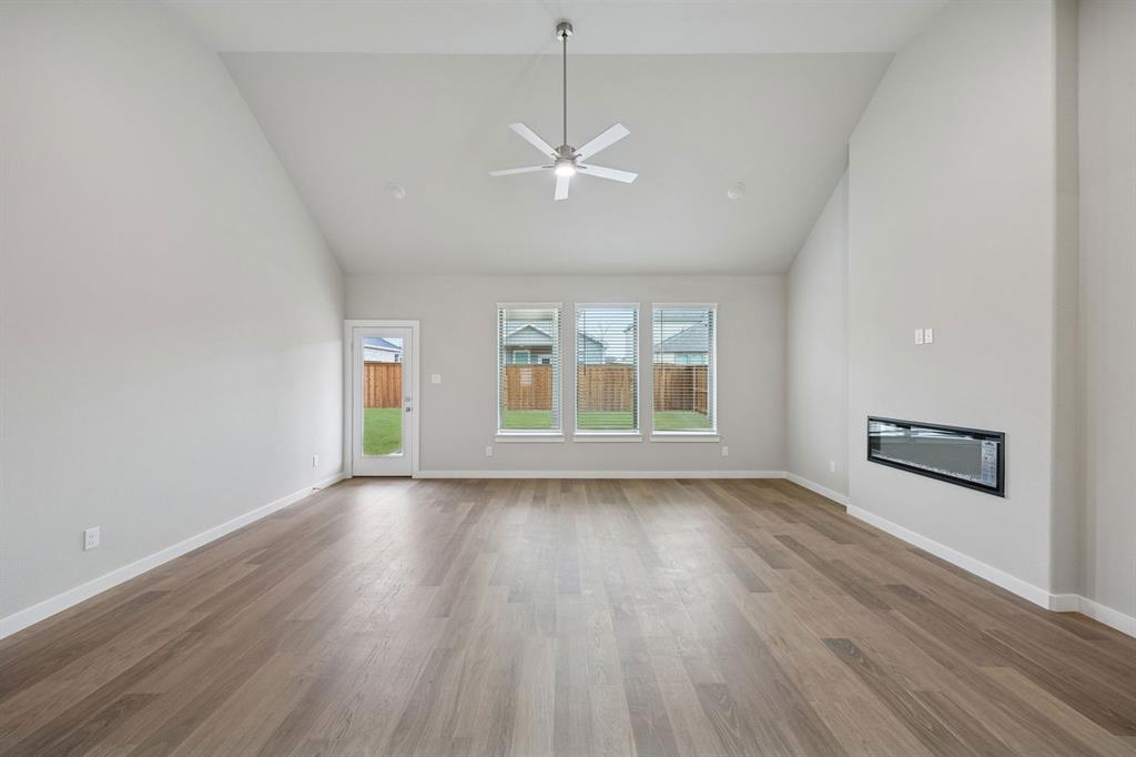 2104 Sunshining Road Princeton, TX 75407 - Photo 13 of 39 Living and Dining Rooms in the Stanley II home plan by Trophy Signature Homes – REPRESENTATIVE PH