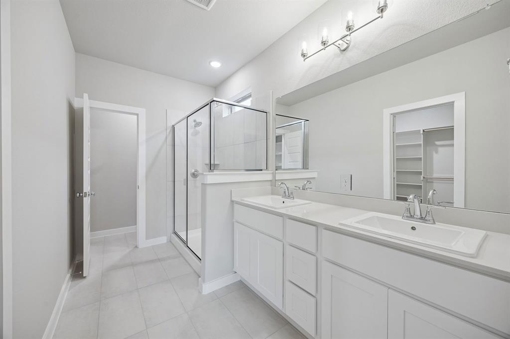 2104 Sunshining Road Princeton, TX 75407 - Photo 21 of 39 Primary Bathroom in the Stanley II home plan by Trophy Signature Homes – REPRESENTATIVE PHOTO