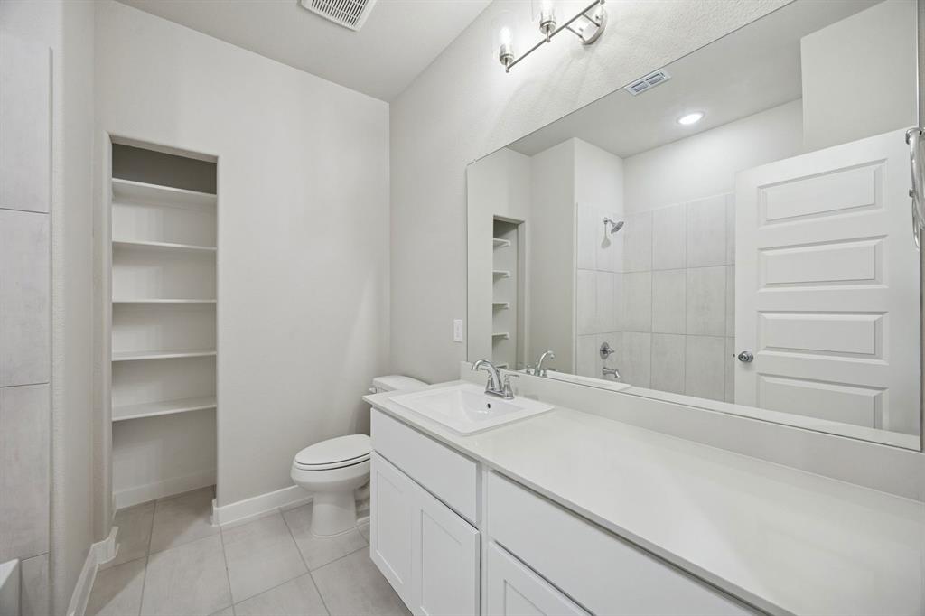 2104 Sunshining Road Princeton, TX 75407 - Photo 30 of 39 Bathroom in the Stanley II home plan by Trophy Signature Homes – REPRESENTATIVE PHOTO