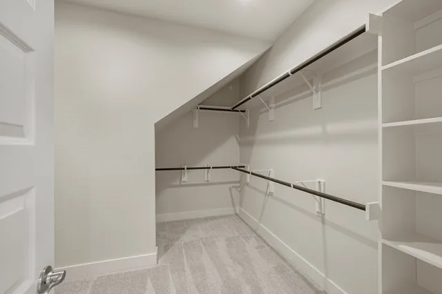 a view of a room with racks on the wall