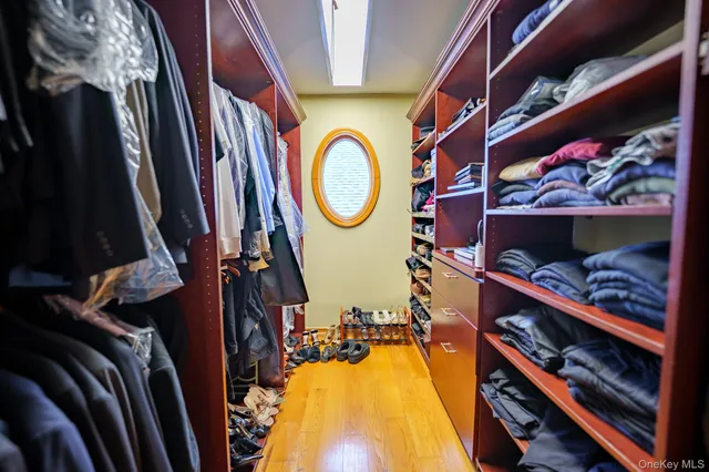 a bed room with bed and window