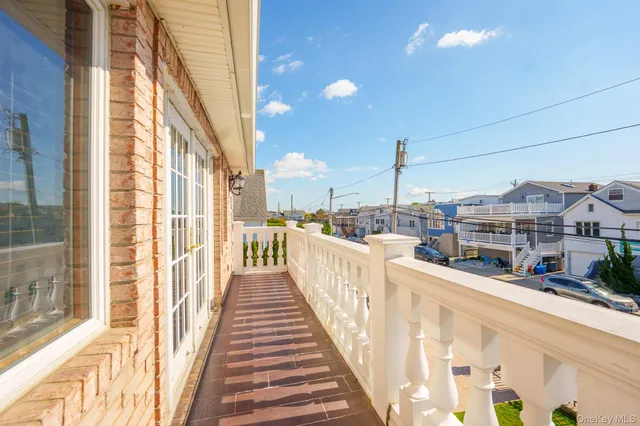 a view of swimming pool with seating area