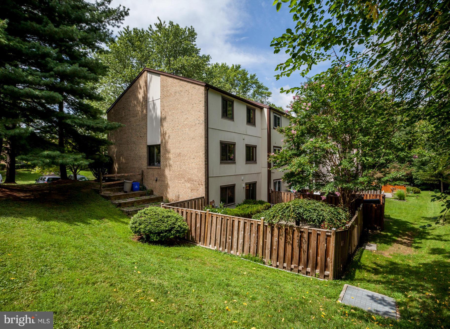 8933 Centerway Road Gaithersburg, MD 20879 - Photo 2 of 29 a house view with a garden space