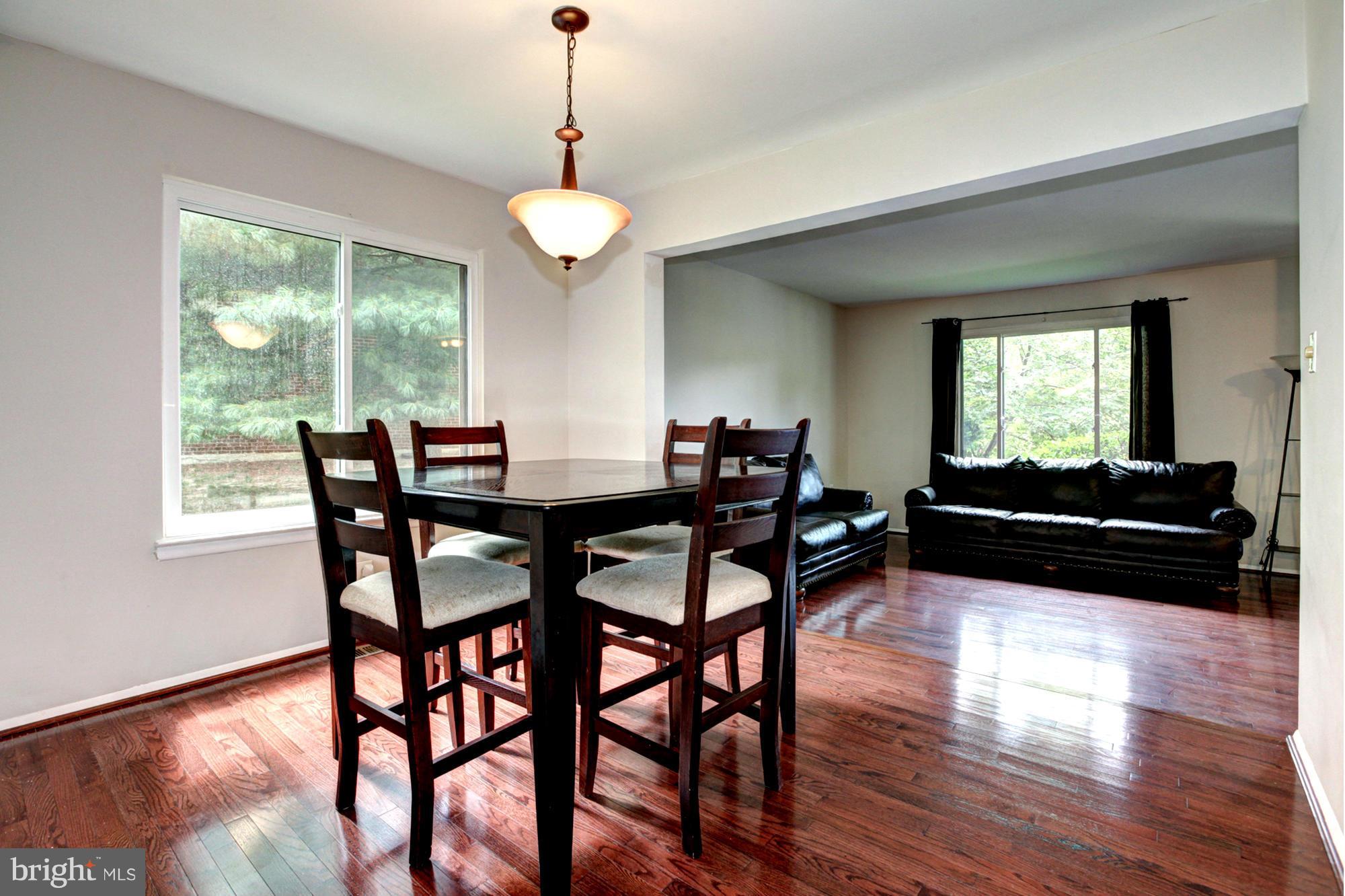 8933 Centerway Road Gaithersburg, MD 20879 - Photo 12 of 29 a living room with furniture and a large window