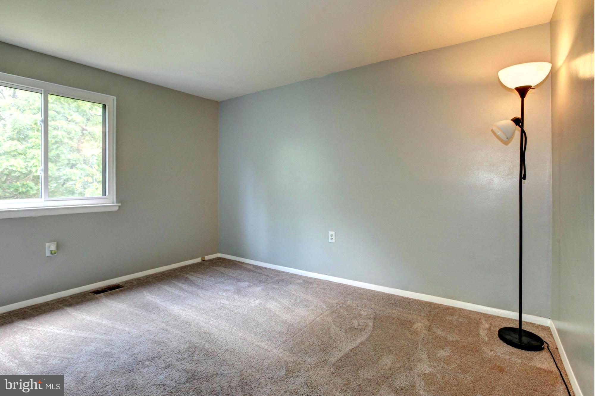 8933 Centerway Road Gaithersburg, MD 20879 - Photo 23 of 29 a view of an empty room with a window
