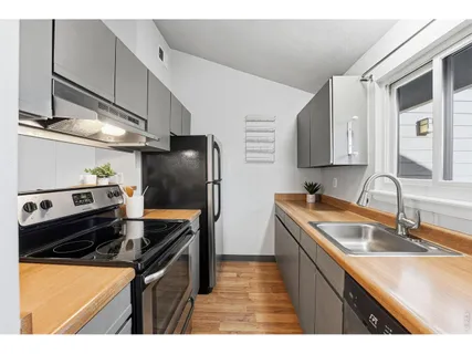 a bedroom with bed and window