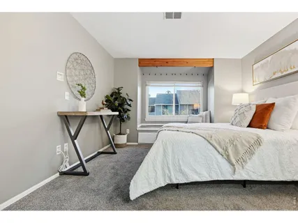 a bathroom with a sink a mirror and a shower