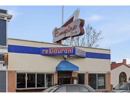 a view of a field with an ocean