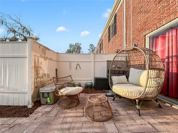 a front view of house with yard and seating area