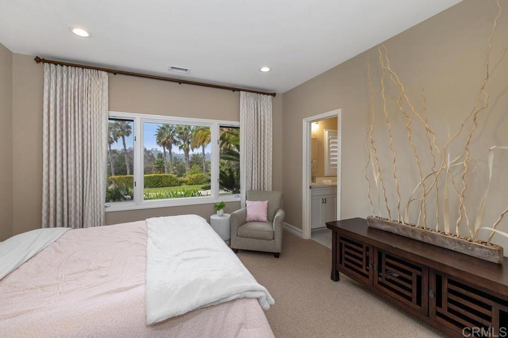 4715 La Noria Rancho Santa Fe, CA 92067 - Photo 15 of 26 a living room with furniture and a flat screen tv