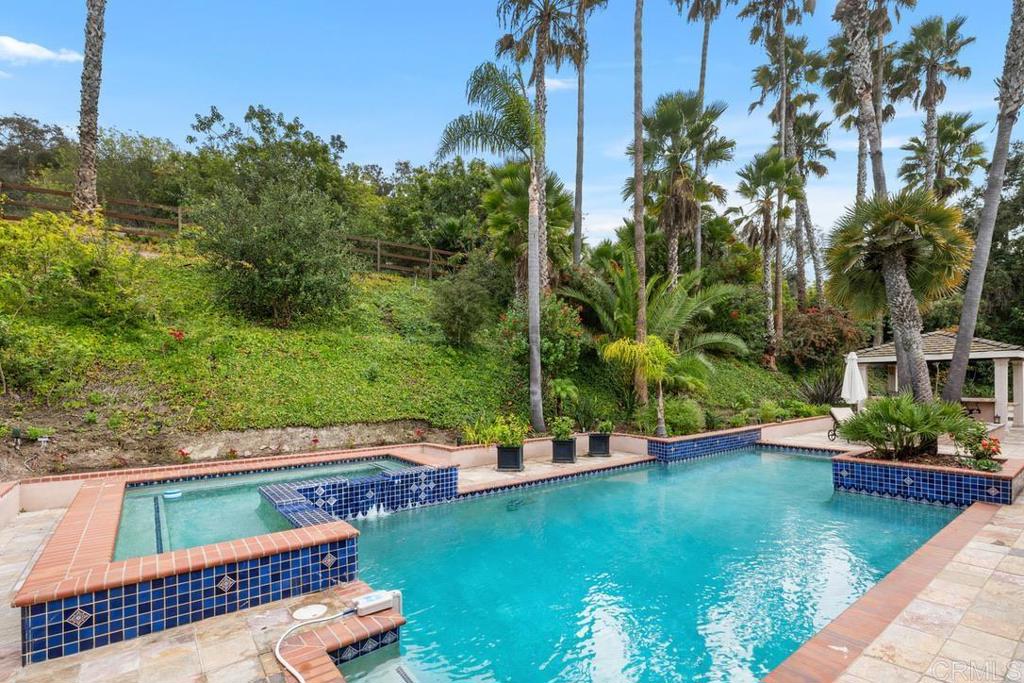 4715 La Noria Rancho Santa Fe, CA 92067 - Photo 17 of 26 a view of house with swimming pool yard and outdoor seating