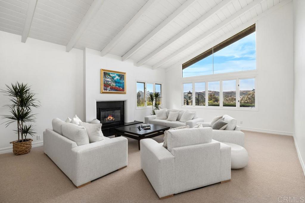 4715 La Noria Rancho Santa Fe, CA 92067 - Photo 6 of 26 a living room with furniture and a large window