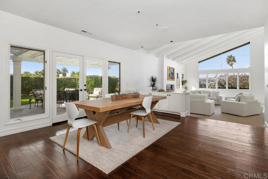 4715 La Noria Rancho Santa Fe, CA 92067 - Photo 8 of 26 a living room with furniture a table and a large window