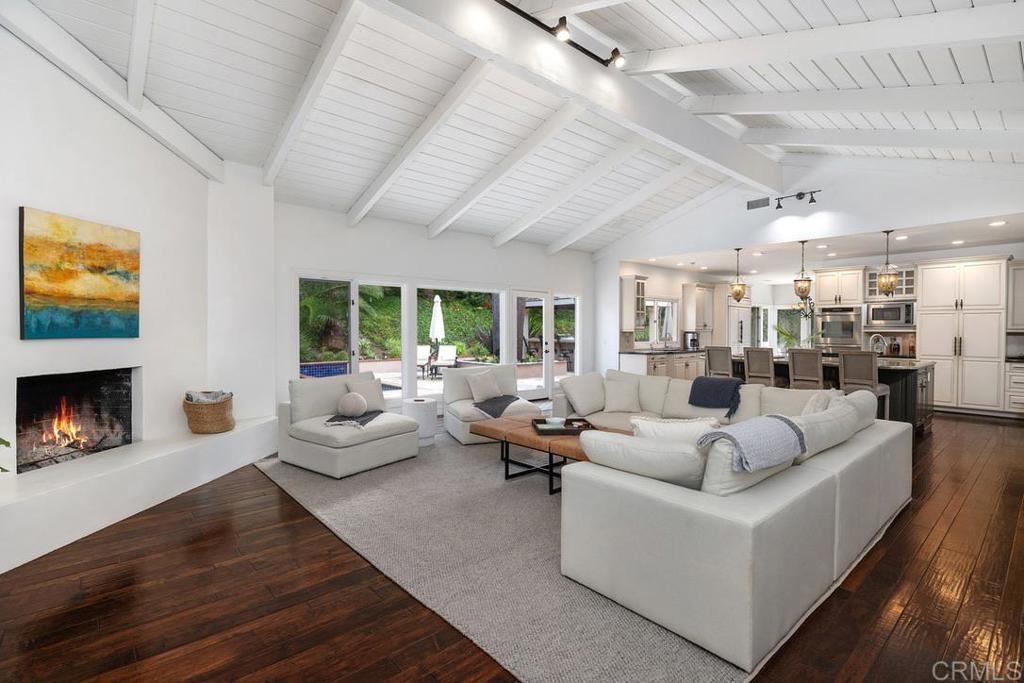 4715 La Noria Rancho Santa Fe, CA 92067 - Photo 10 of 26 a living room with fireplace furniture and a fireplace
