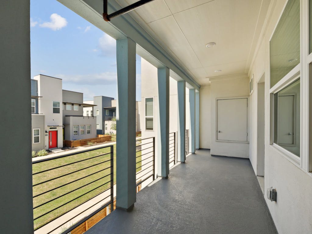 9015 Cattle Baron Path, Unit 2003 Austin, TX 78747 - Photo 16 of 31 a view of a hallway with closet