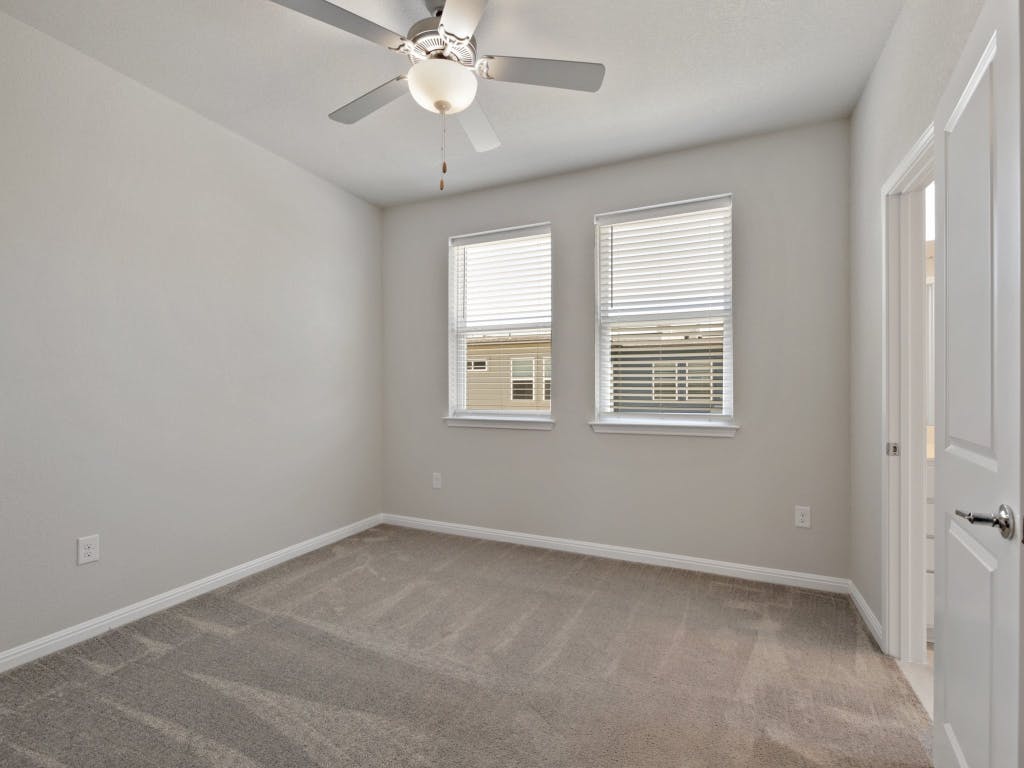 9015 Cattle Baron Path, Unit 2003 Austin, TX 78747 - Photo 22 of 31 an empty room with a window