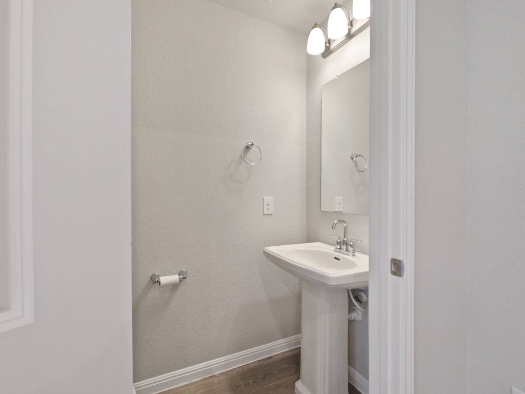 9015 Cattle Baron Path, Unit 2003 Austin, TX 78747 - Photo 23 of 31 a bathroom with a sink and a mirror
