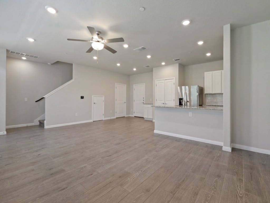 9015 Cattle Baron Path, Unit 2003 Austin, TX 78747 - Photo 8 of 31 a view of an empty room and kitchen view